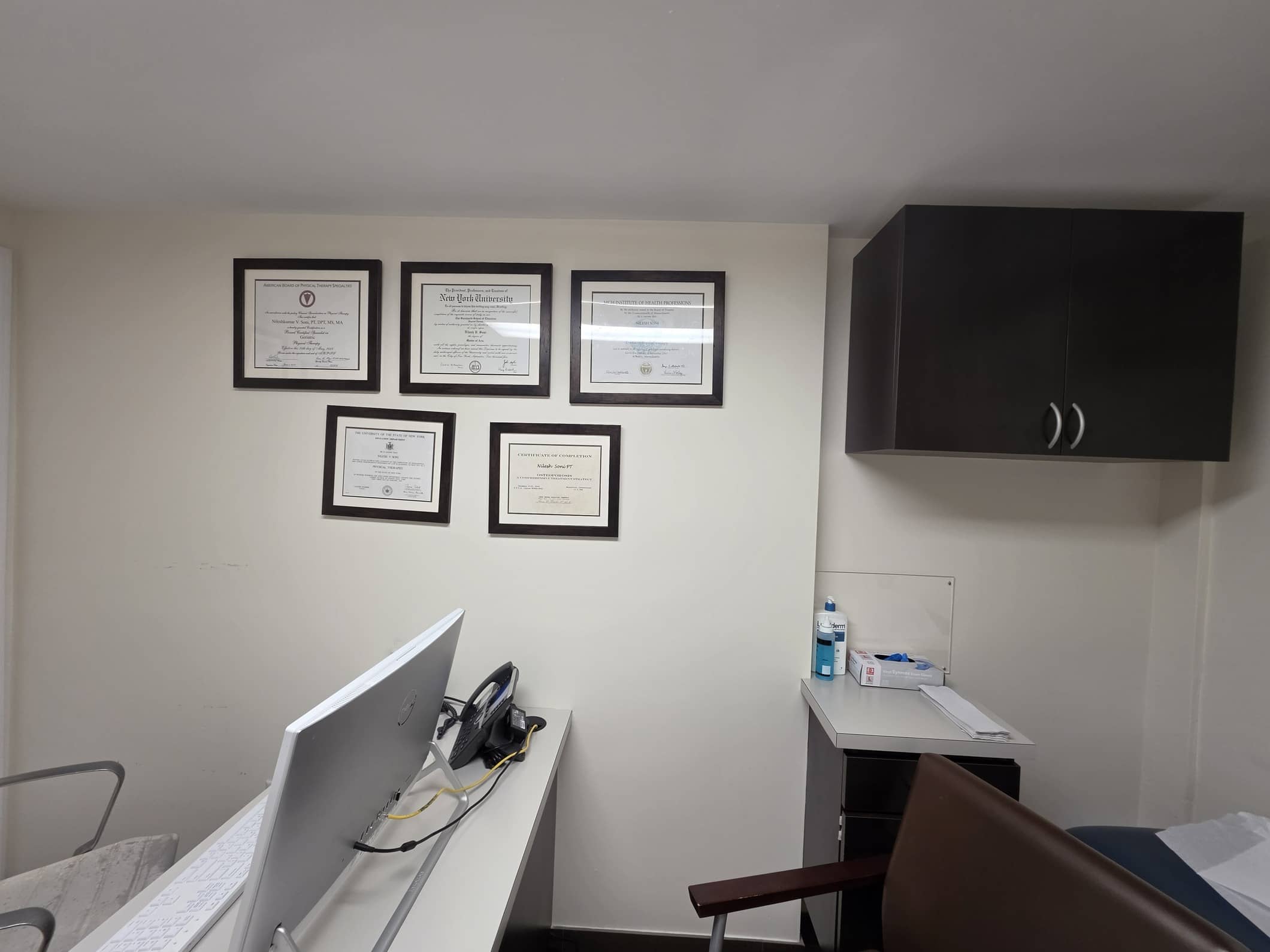 Clinician office at the Glen Oaks clinic with framed clinical credentials
